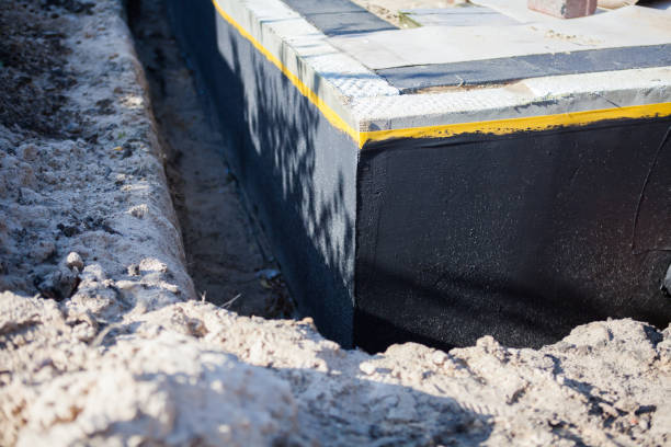Professional Waterproofing technician working in Wapakoneta, OH